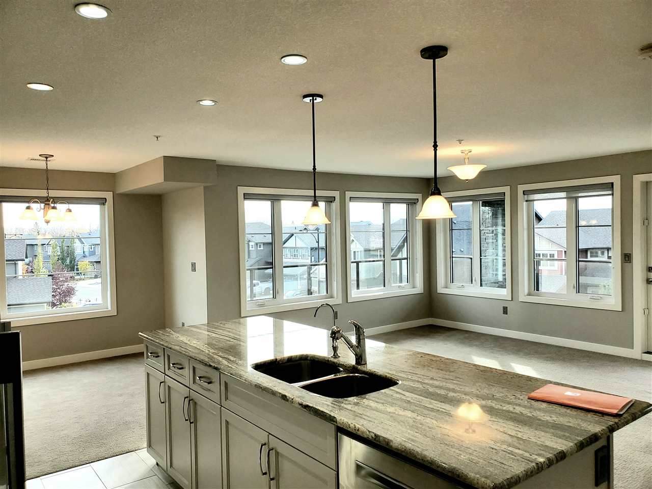 306 5029 Edgemont Boulevard - Photo 1