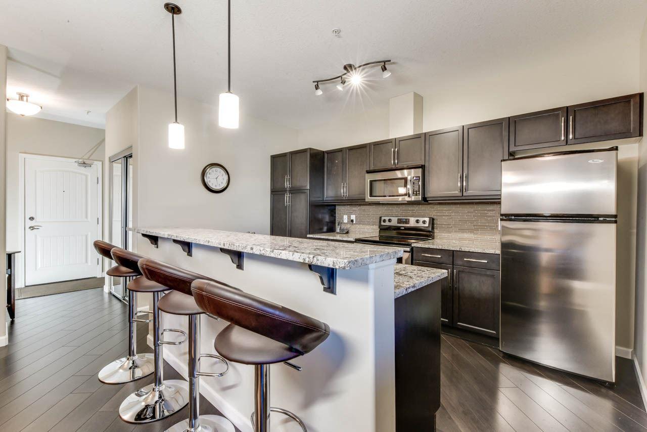 211 6083 Maynard Way - Photo 1