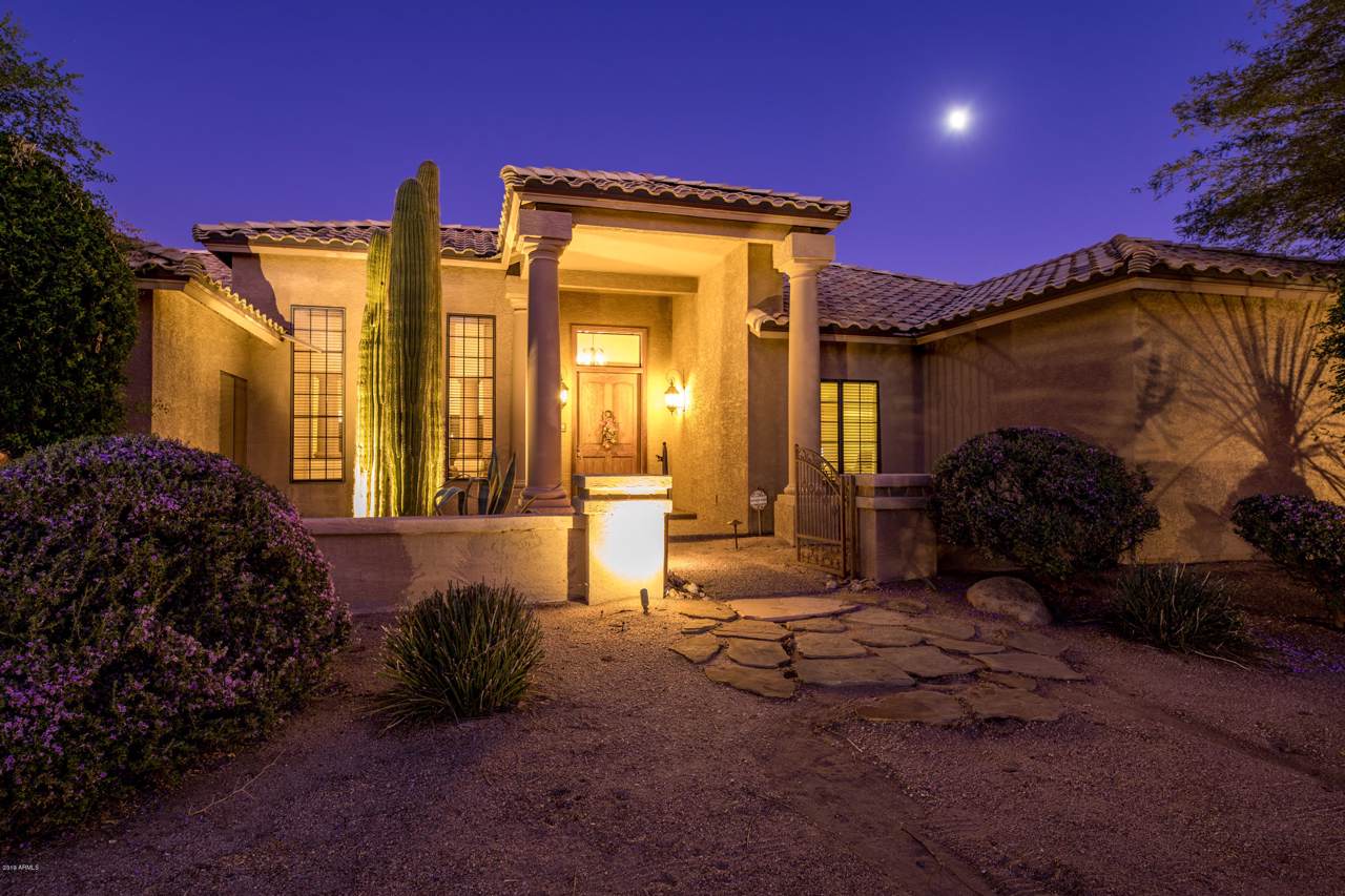 8433 Whispering Wind Drive - Photo 1