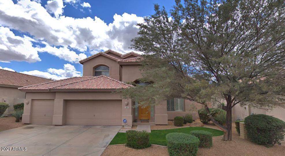 7513 Whistling Wind Way - Photo 1