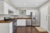 7601 Windrush Dr - Photo 16