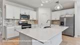 9425 Buckstitch Saddle Dr - Photo 16