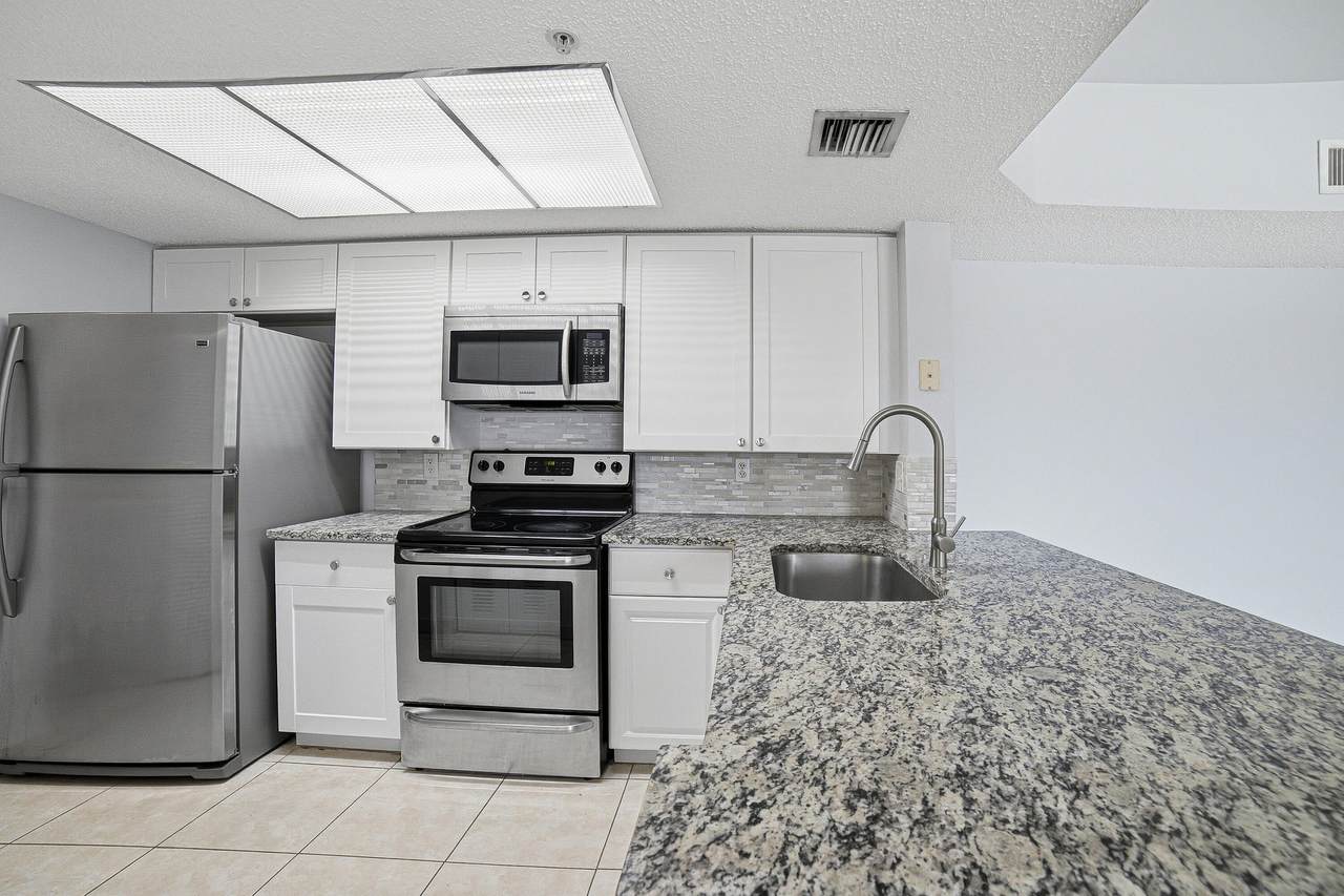 5045 Wiles Road - Photo 1