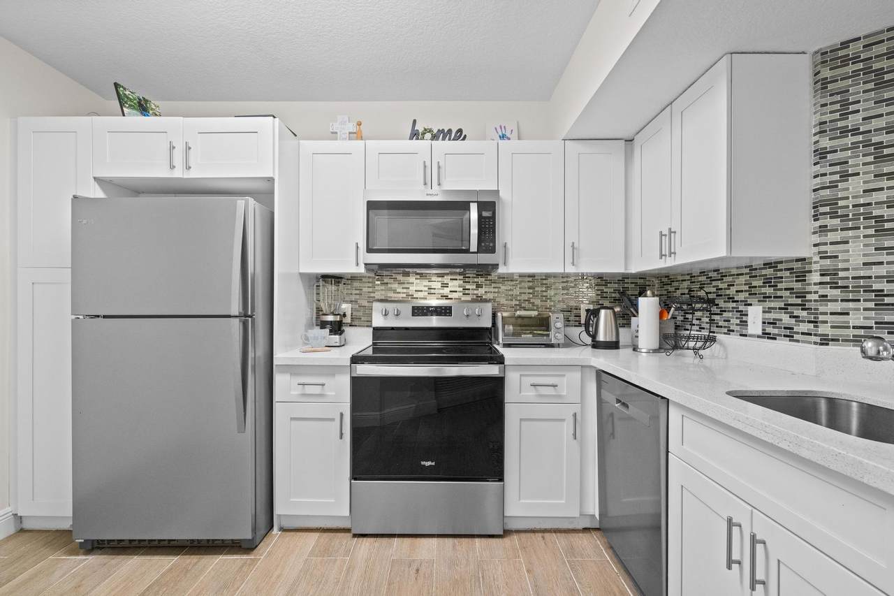 8851 Wiles Rd - Photo 1