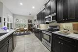 11210 Millpond Greens Drive - Photo 10
