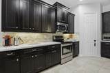 11210 Millpond Greens Drive - Photo 12