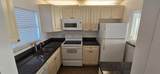 9949 Sandalfoot Boulevard - Photo 2