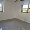 2001 Woolbright Road - Photo 6