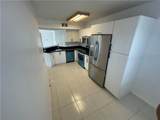 9033 Wiles Road - Photo 7