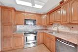 10777 Sample Rd - Photo 12