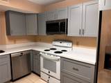 8701 Wiles Road - Photo 3