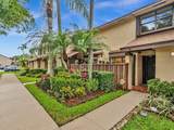 3950 Cocoplum Cir - Photo 1