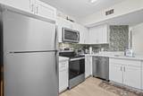 8851 Wiles Rd - Photo 3