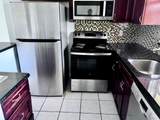 9851 Sandalfoot Boulevard - Photo 2