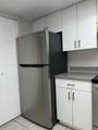 5001 Wiles Road - Photo 9