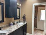7747 Riverside Farm Road - Photo 24