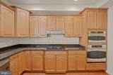 7049 Huntley Run Place - Photo 7