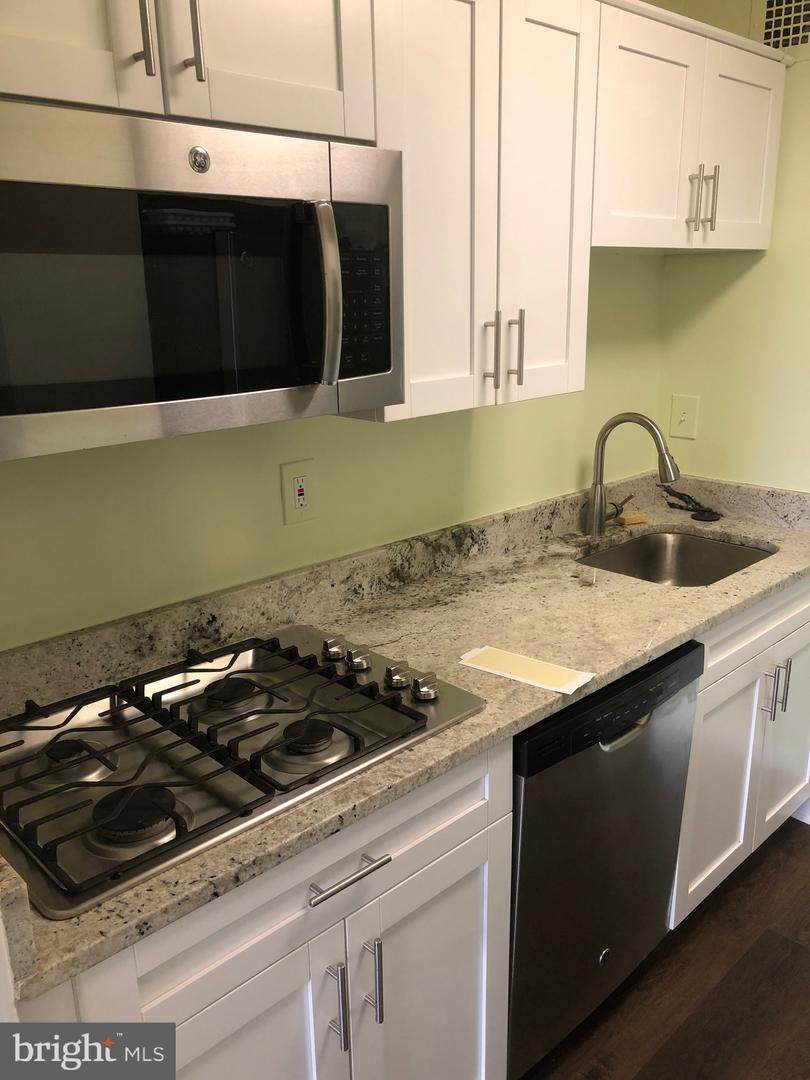 10401 Grosvenor Place - Photo 1