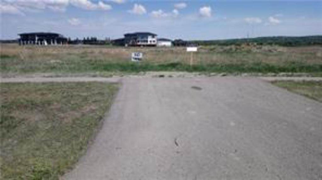 242176 Windhorse Way - Photo 1