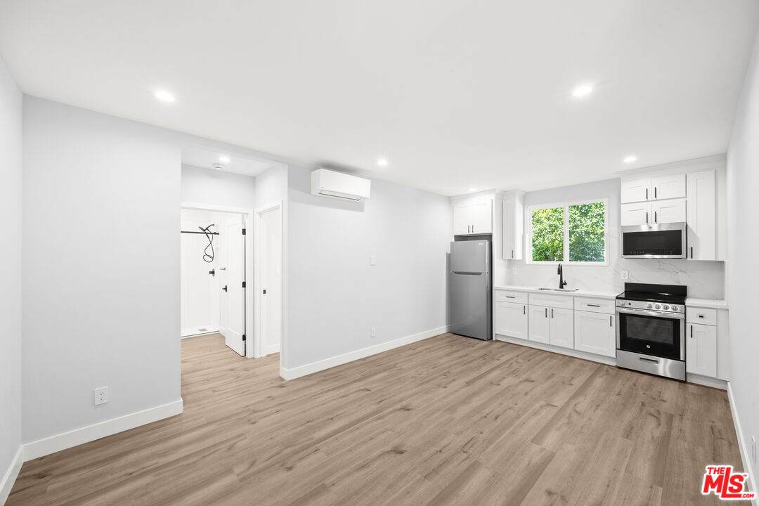 1560-1 Genesee Ave - Photo 1
