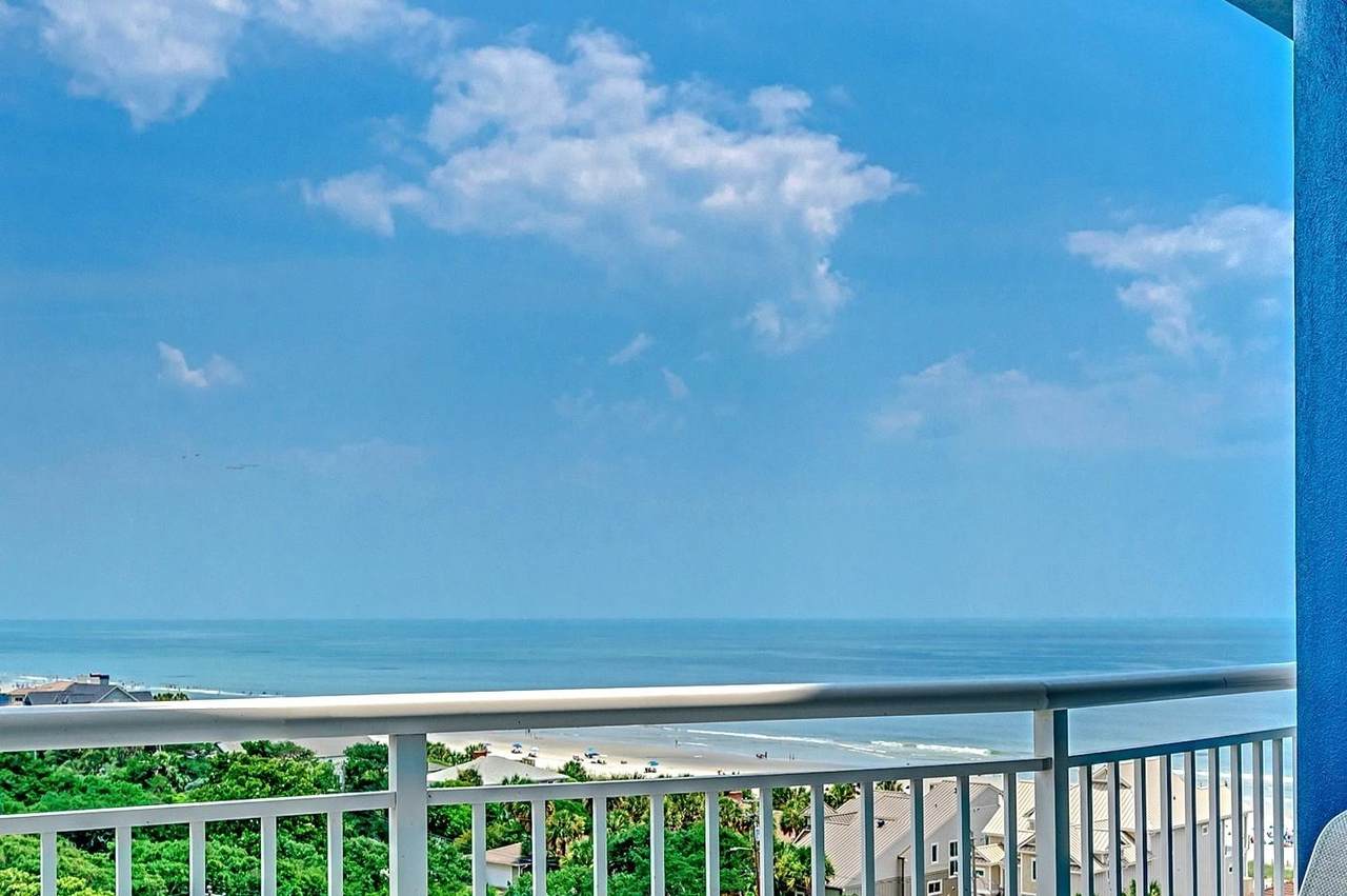Furnished bedroom with ocean-view window