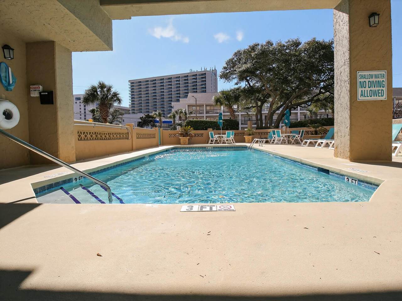 Outdoor community pool at Ocean Dunes Tower I