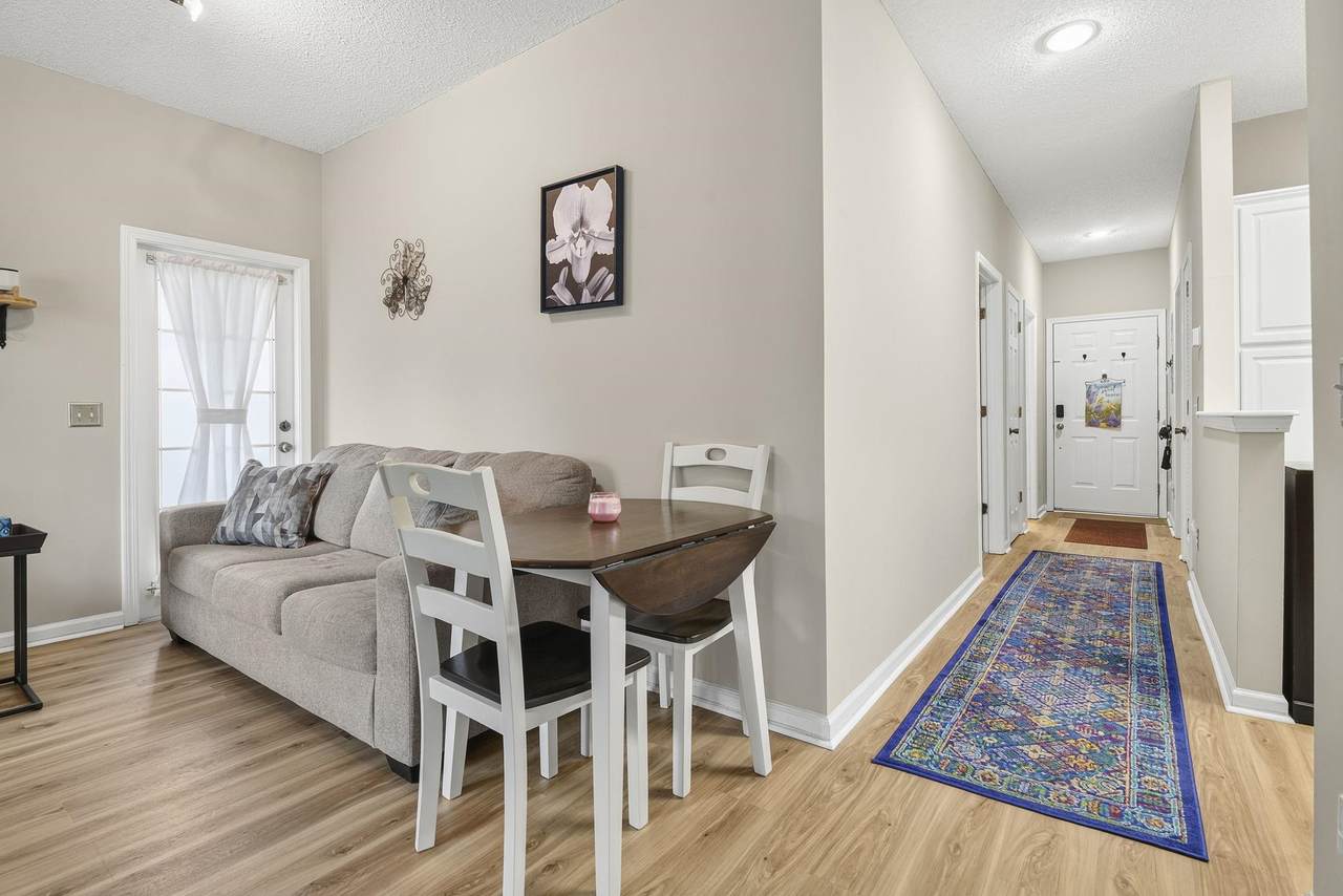 Primary bedroom with carpet and ceiling fan