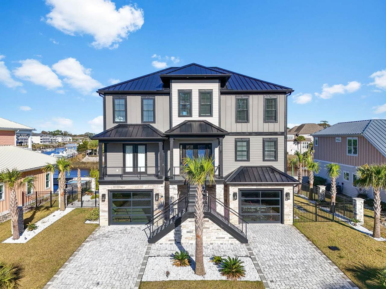 Front exterior of the waterfront home at 105 Serenity Point Drive