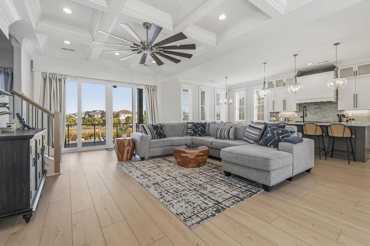 Living and dining space opening toward the rear deck