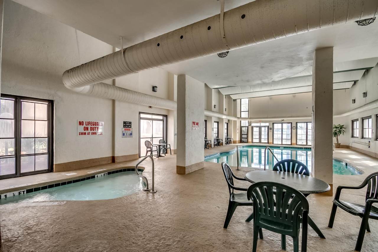 Indoor pool area with seating