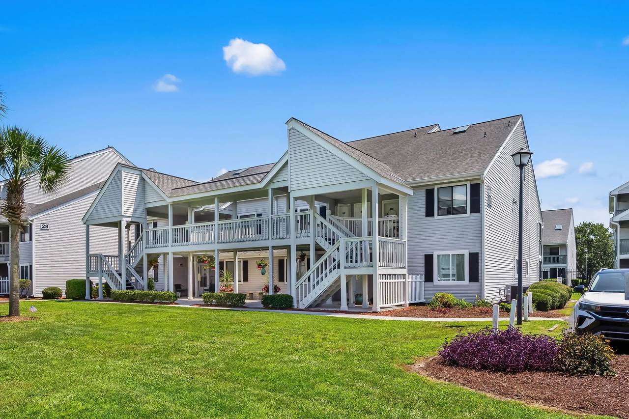 Exterior of the Golf Colony condo building at 1880 Auburn Lane