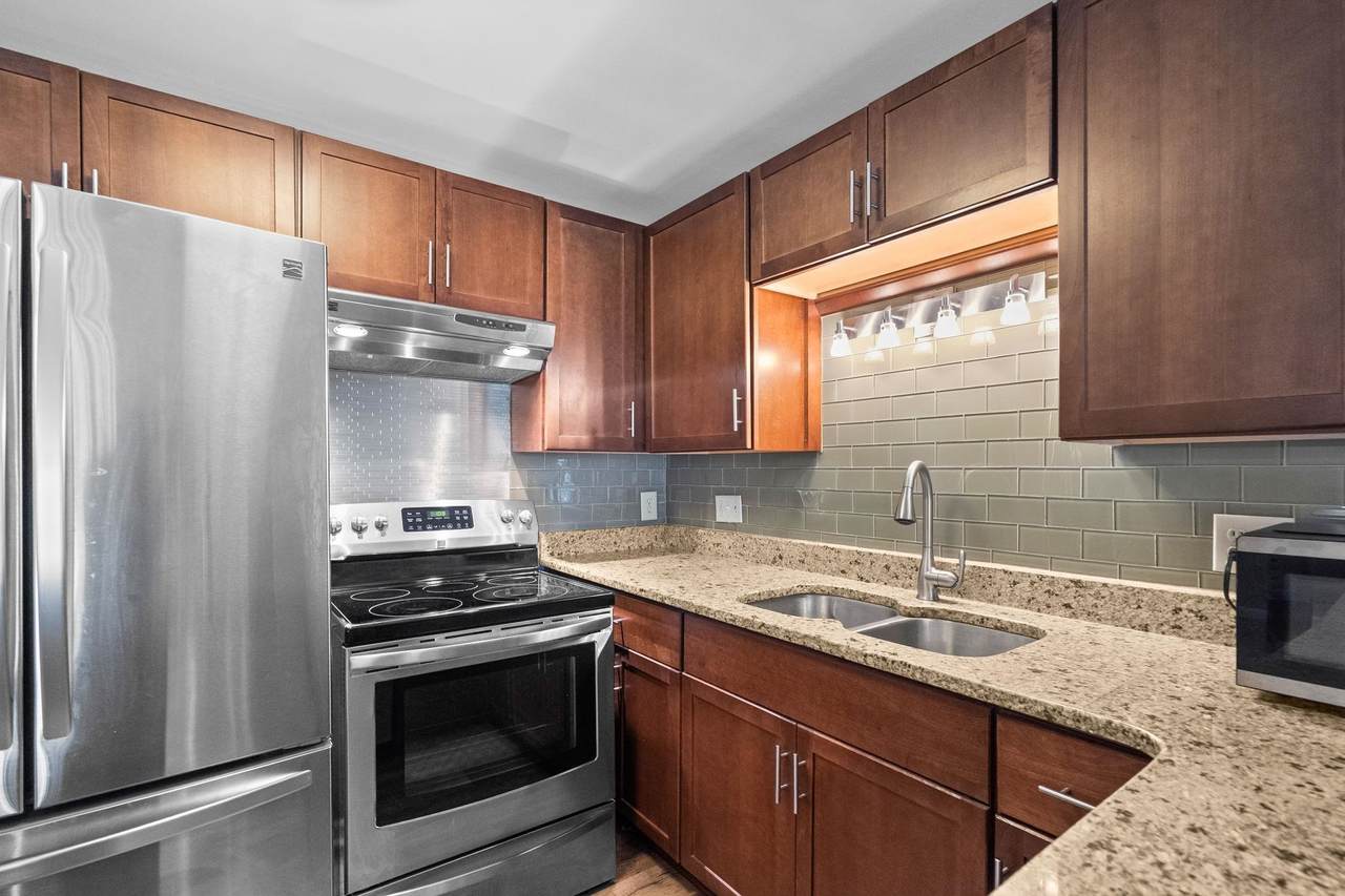 Solid-surface kitchen counters and stainless-steel appliances