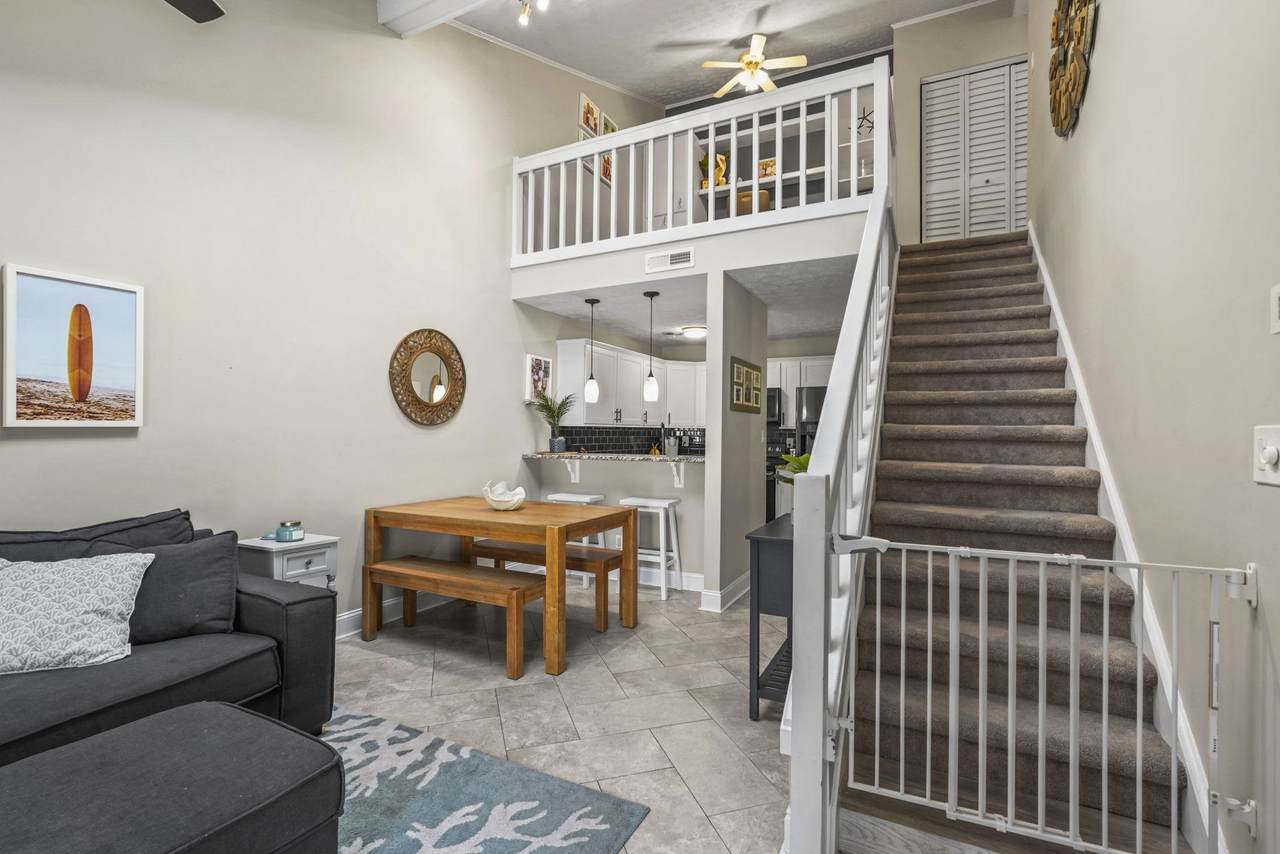 Two-story living area with loft and staircase