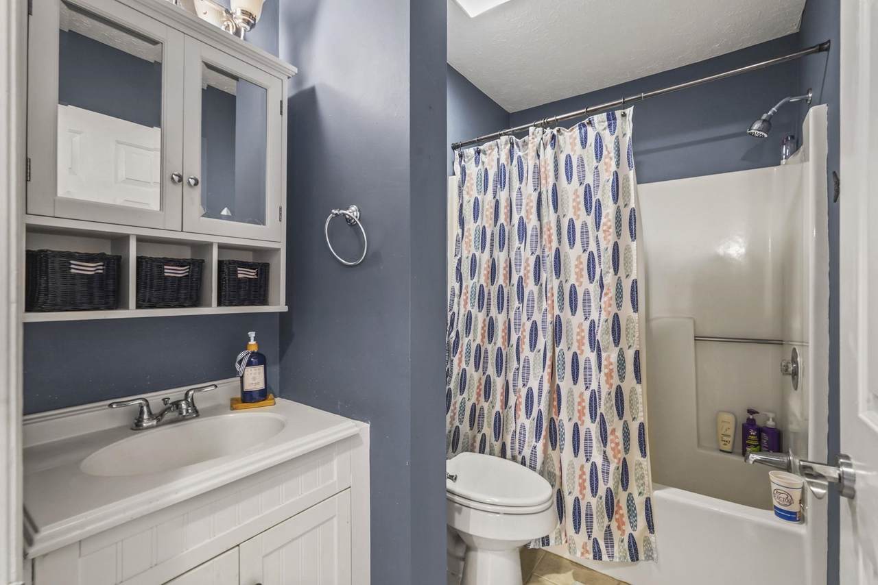 Bathroom with tub-shower combination