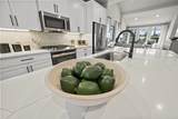 8807 Arcadius Dr - Photo 4