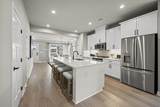 8807 Arcadius Dr - Photo 6