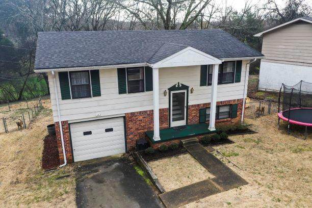 7706 Village Ln - Photo 1