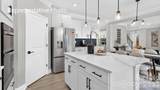 7039 Sylvan Retreat Drive - Photo 18