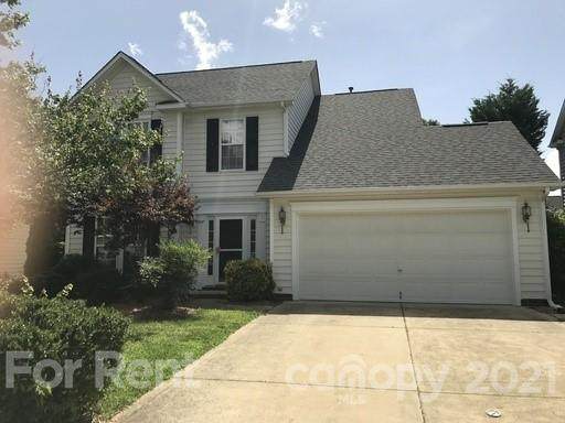 5506 Whispering Wind Lane - Photo 1