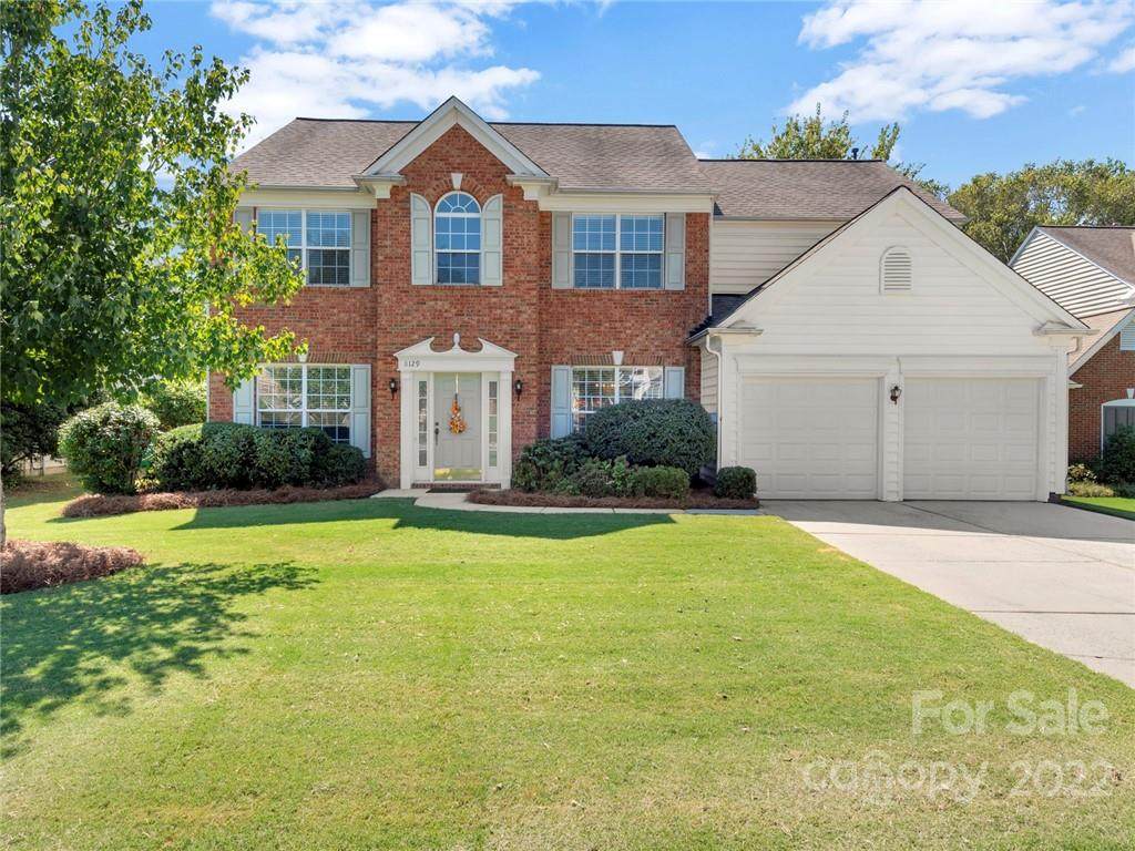 8129 Noland Woods Drive - Photo 1