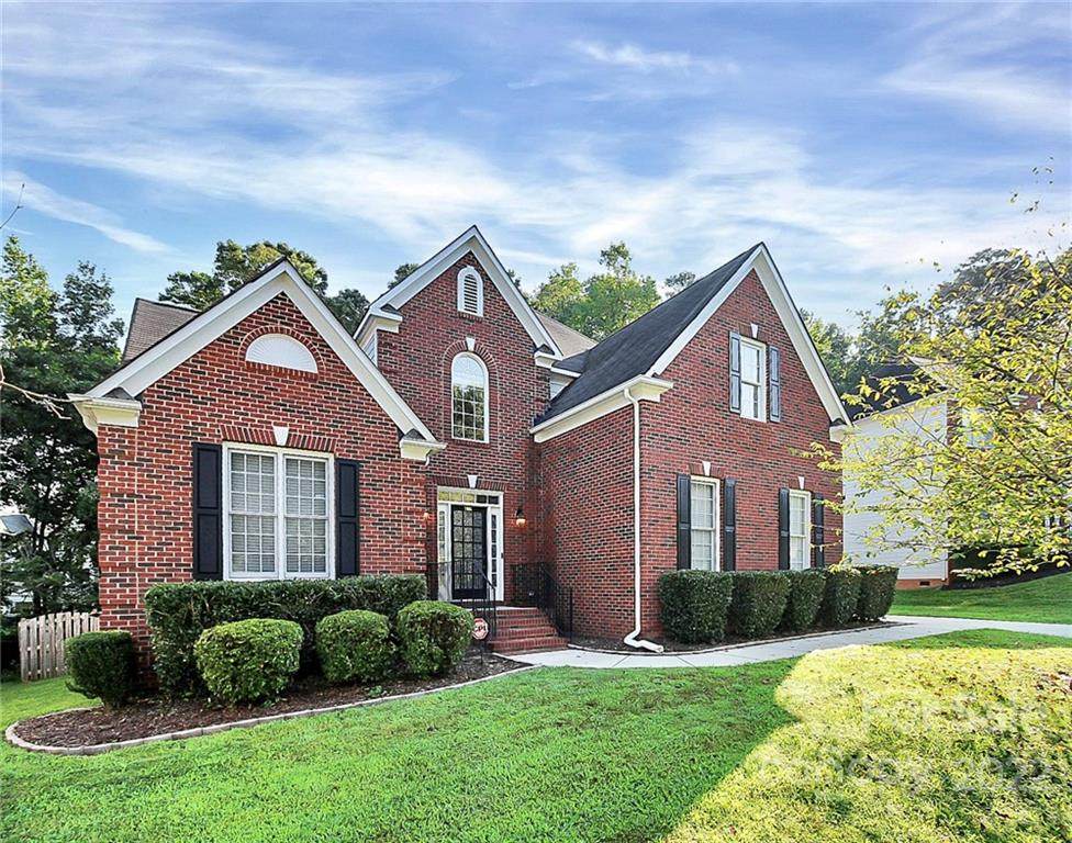 7905 Harrington Woods Road - Photo 1
