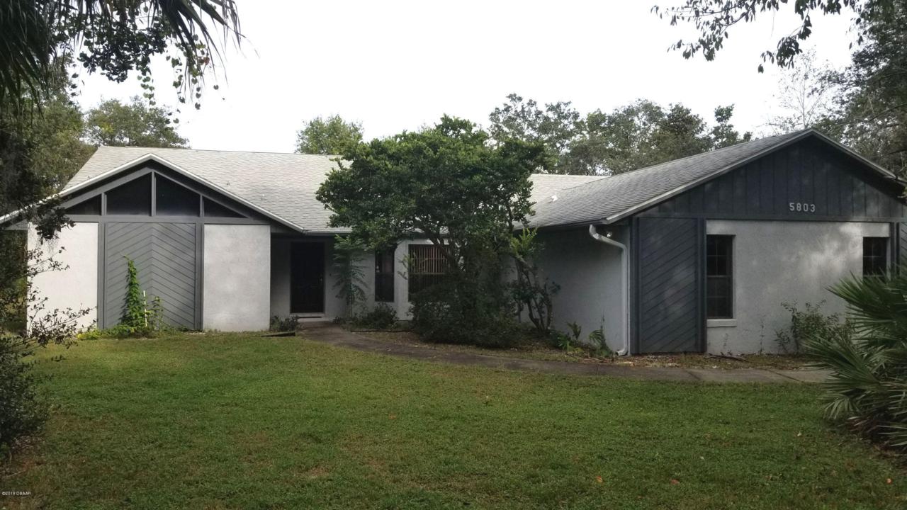 5803 Spruce Creek Woods Drive - Photo 1