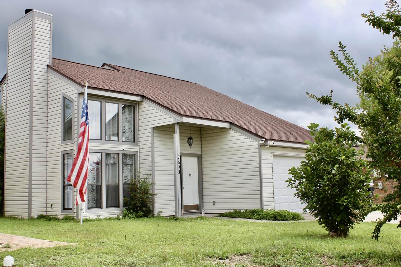 7623 Whisperwood Drive - Photo 1