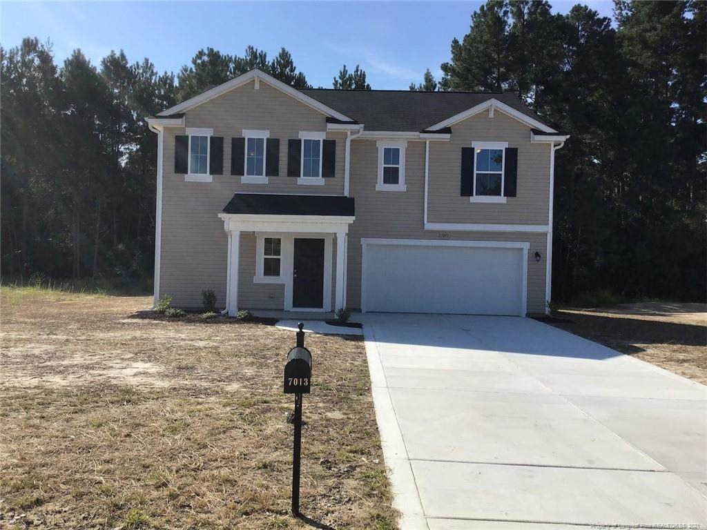 7013 Woodmark Drive - Photo 1