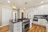 9570 Huntcliff Trace - Photo 11