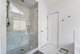 9570 Huntcliff Trace - Photo 28