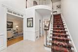 9570 Huntcliff Trace - Photo 3