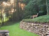 9570 Huntcliff Trace - Photo 43