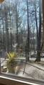 9570 Huntcliff Trace - Photo 45