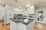 9570 Huntcliff Trace - Photo 8